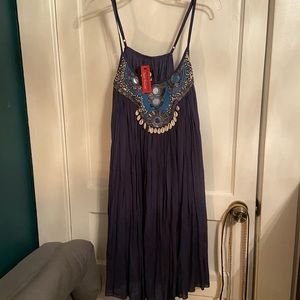 NWT. French dress, size M. Adjustable straps.